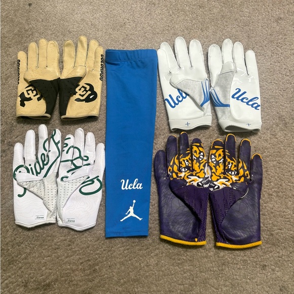 ncaa college gloves and sleeves and towel